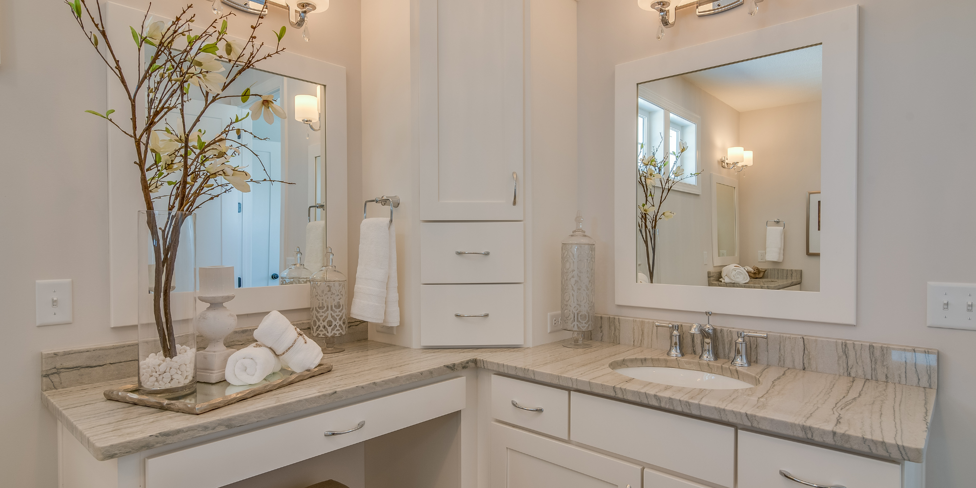 Modern bathroom with a floating custom vanity, featuring ample storage and sleek design for optimizing small spaces.